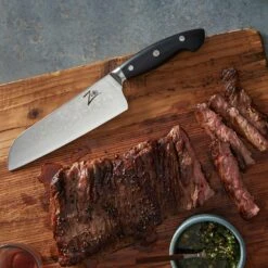 Executive-Plus Serie 7" Santokumesser 61 HRC Damaszenerstahl -Küchengeräte 10039011 de 0005 logo